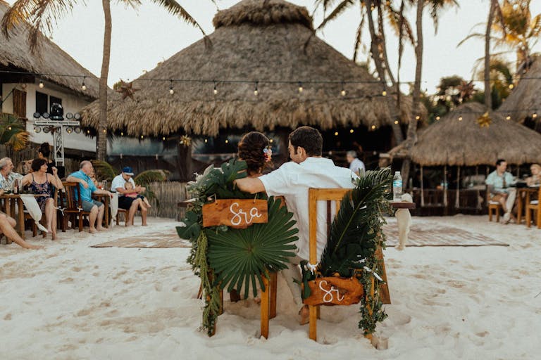 Beachfront wedding with tropical ambiance | PartySlate