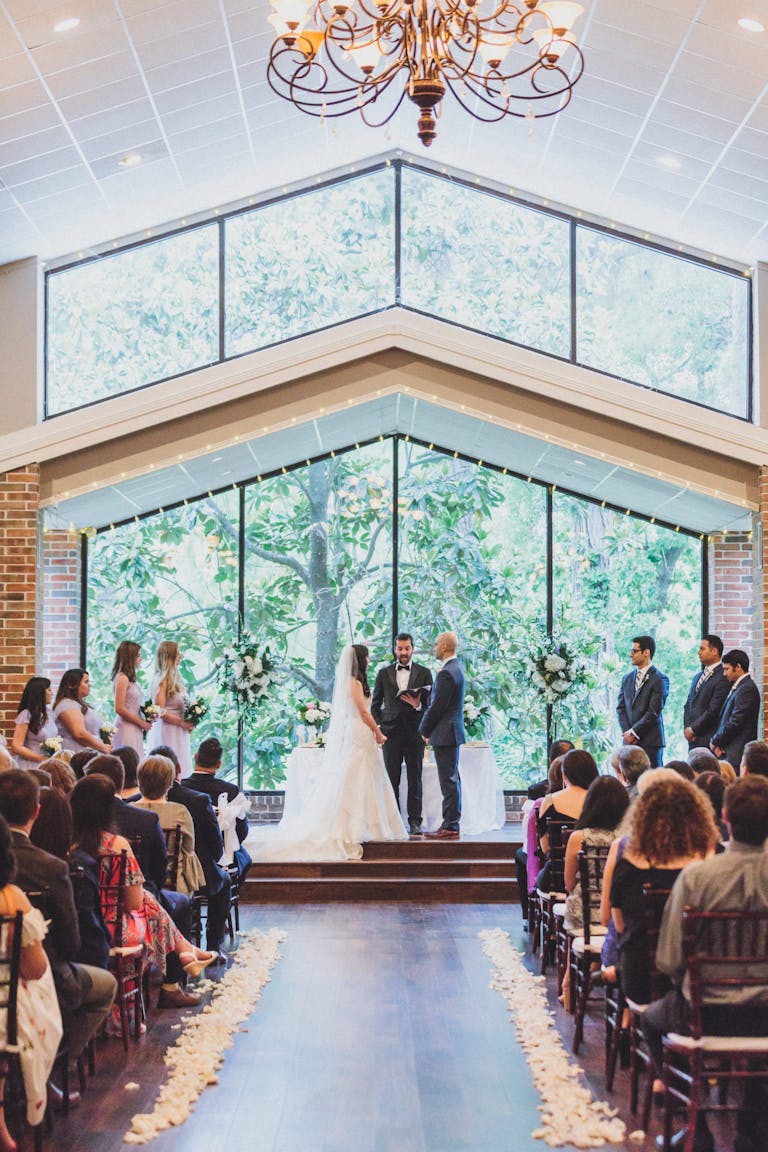 Wedding Ceremony in The Garden Room at Shirley Acres, an Outdoor Wedding Venue in Houston | PartySlate