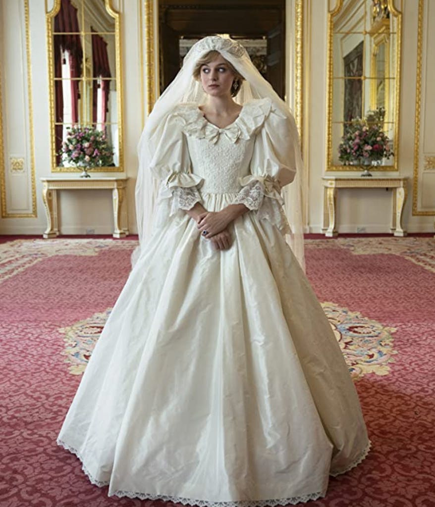 Photo of the actress playing Princess Diana on The Crown wearing a wedding dress
