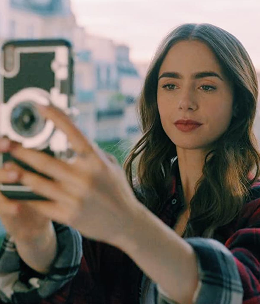Emily Cooper from Emily in Paris taking a selfie