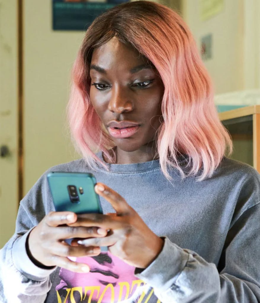 Arabella from I May Destroy You on her phone