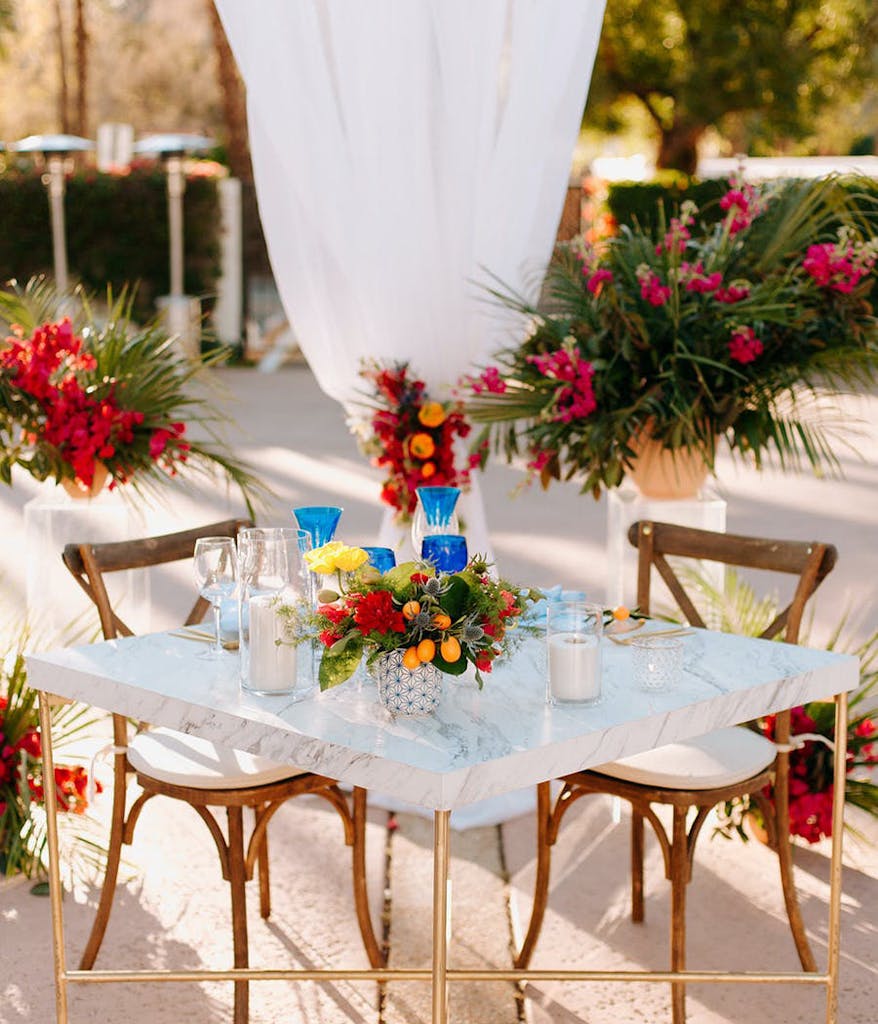 sweetheart table at a tropical wedding at La Quinta Resort & Club