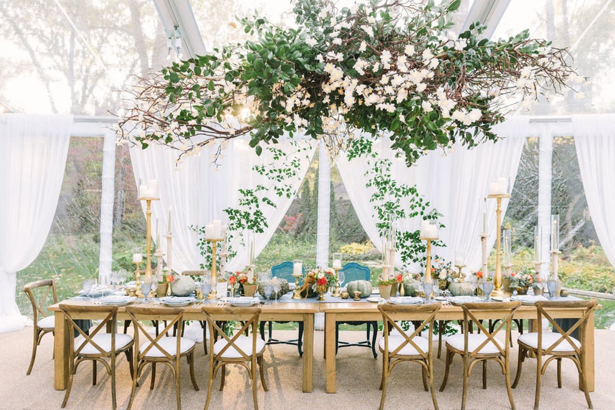 Tented Wedding With Rustic Wedding Centerpieces and Greenery | PartySlate
