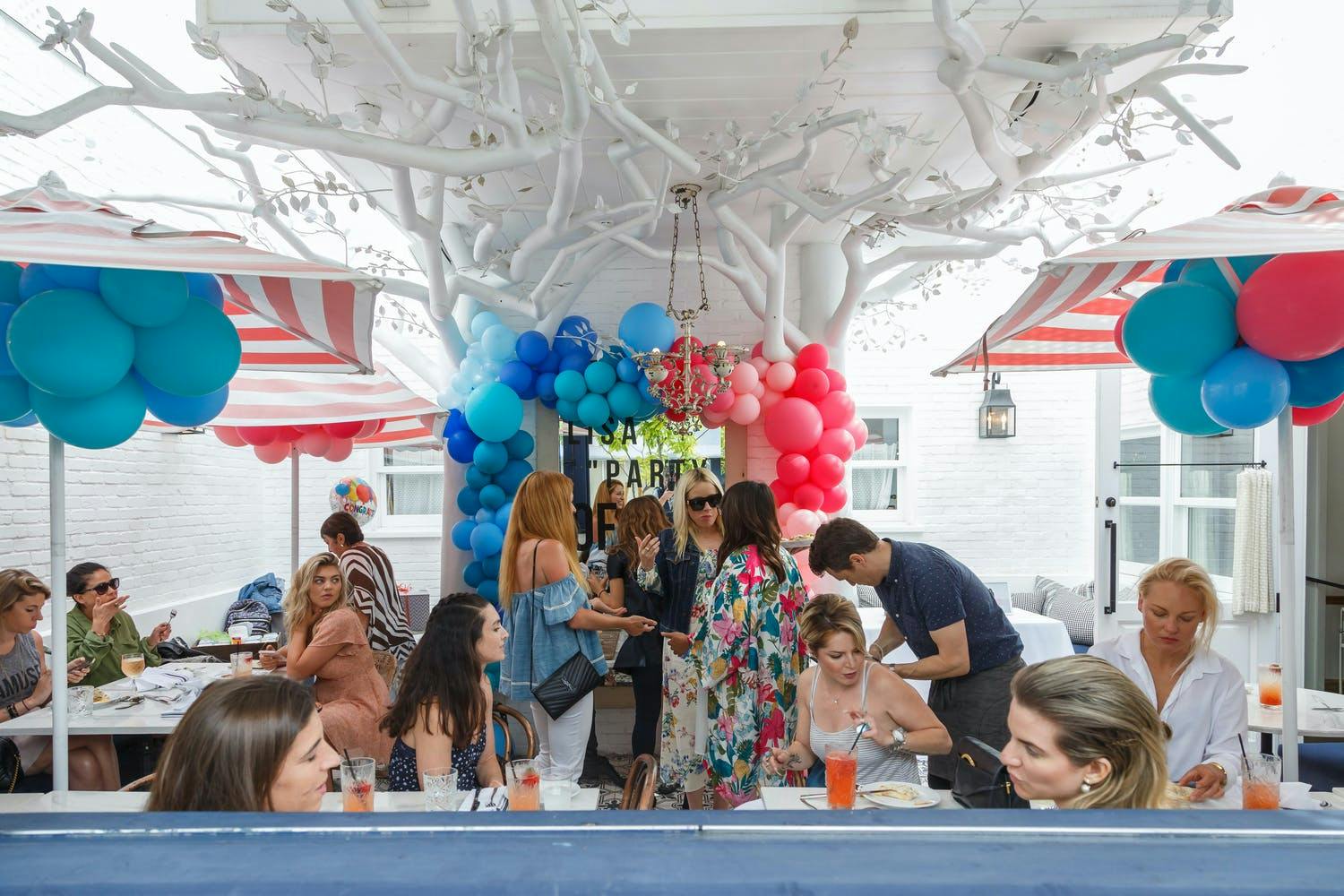 Outdoor Baby Shower With Blue and Red Balloon Décor | PartySlate