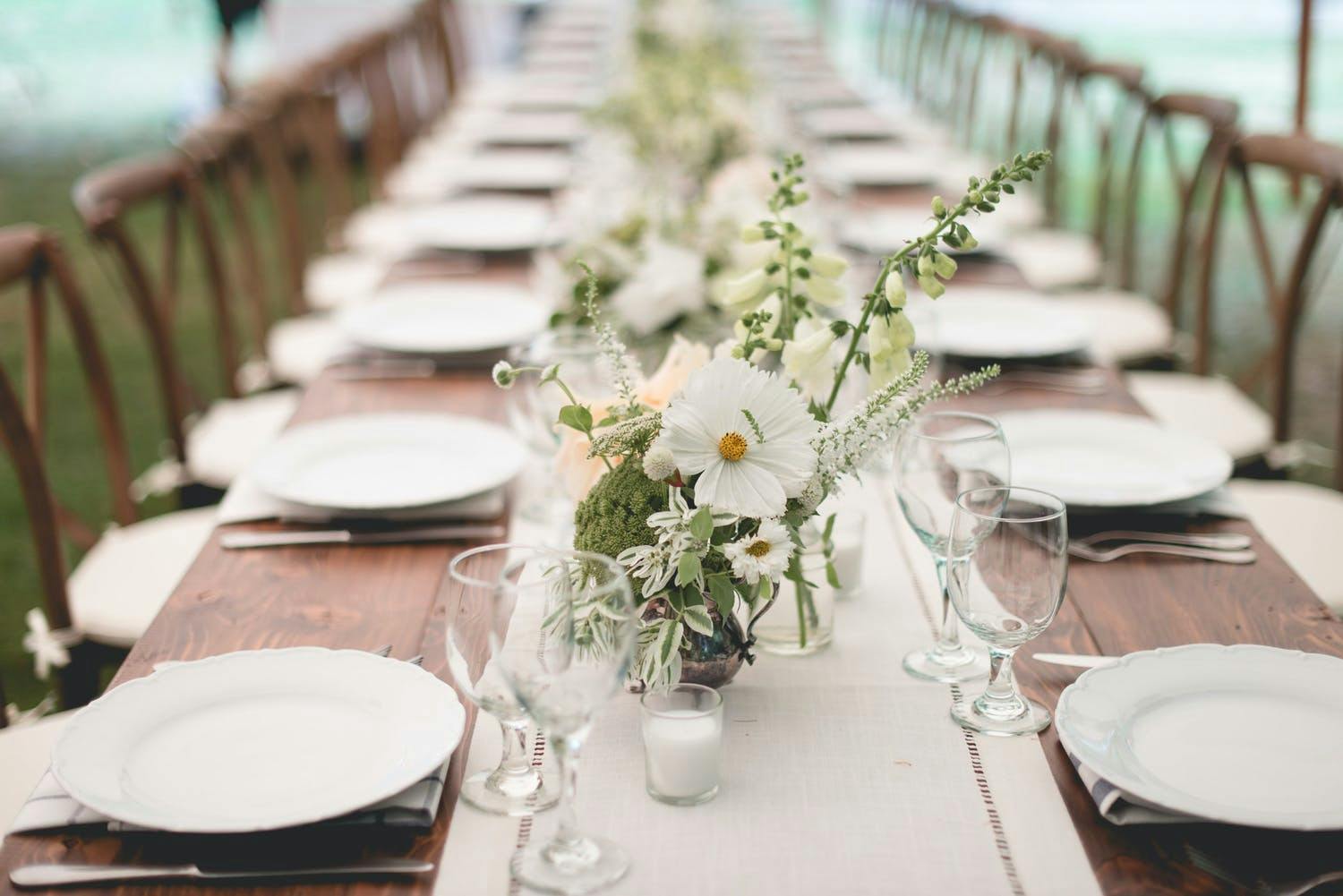 Rustic Wedding Tablescape with Pale Green and White Flowers | PartySlate