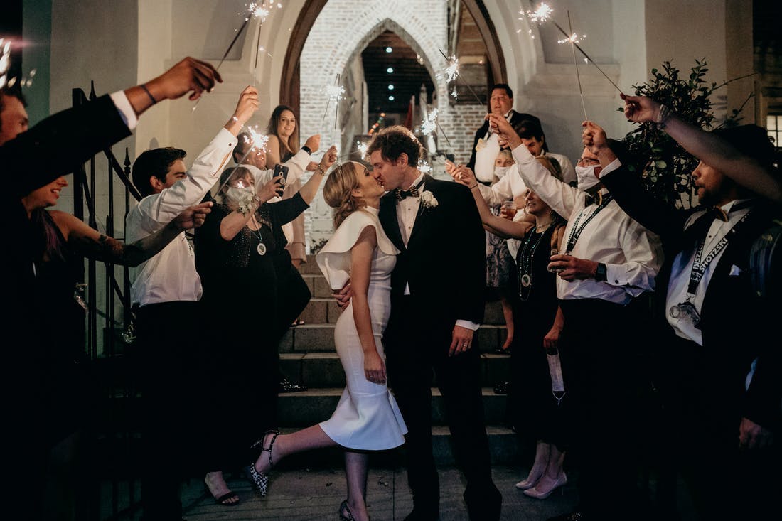 A micro wedding send off with sparklers | PartySlate