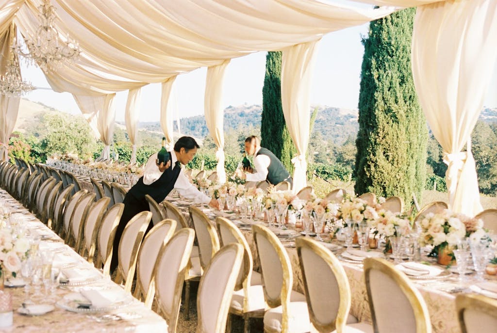 Open Frame Wedding Tent With Cream-Colored Drapery in Sonoma Hills | PartySlate