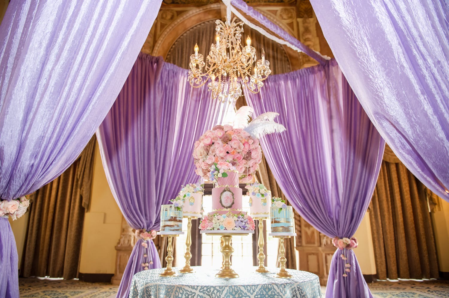 Marie Antoinette-Themed Baby Shower With Purple Drapery, Pink Florals, and Pastel Desserts | PartySlate