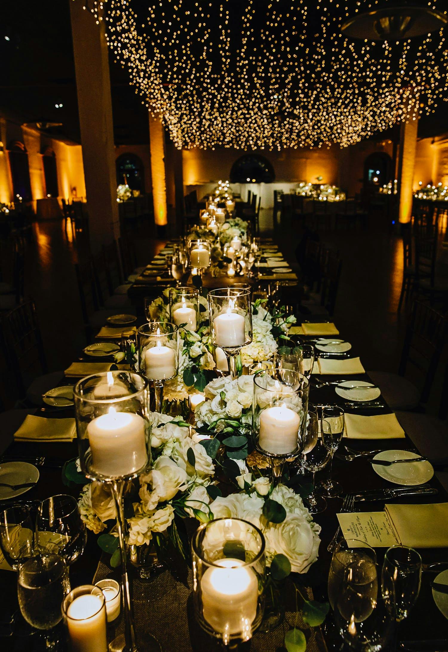 Elegant Wedding With Glimmering Ceiling Installation | PartySlate