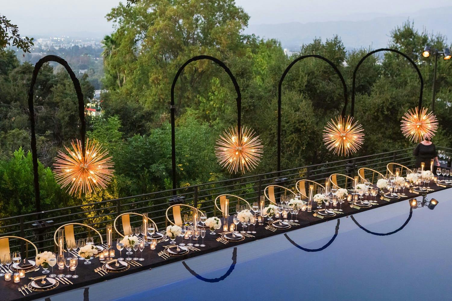 Outdoor Tablescape With Sputnik Lighting for Star Wars 50th Birthday Party Themes | PartySlate