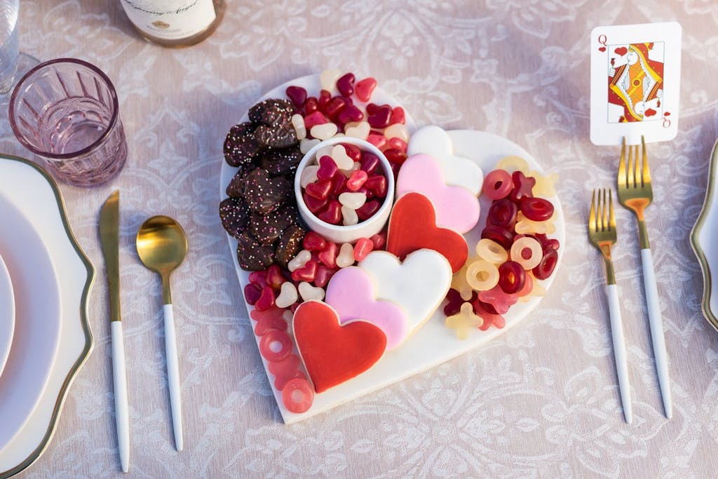 A charcuterie board with Valentine's inspired sweets.