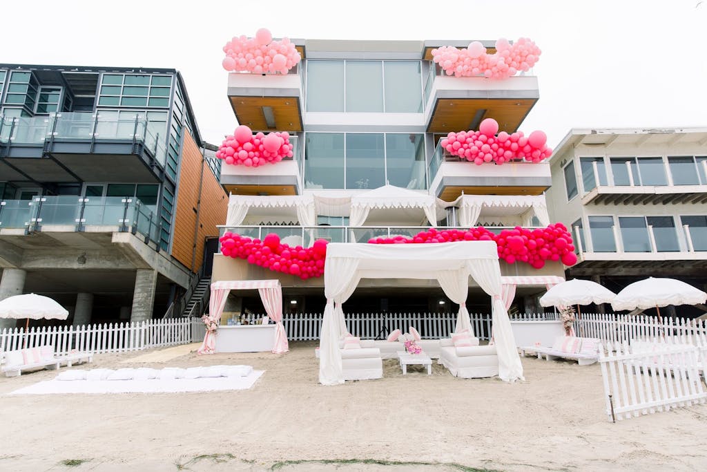A party with pink balloons.