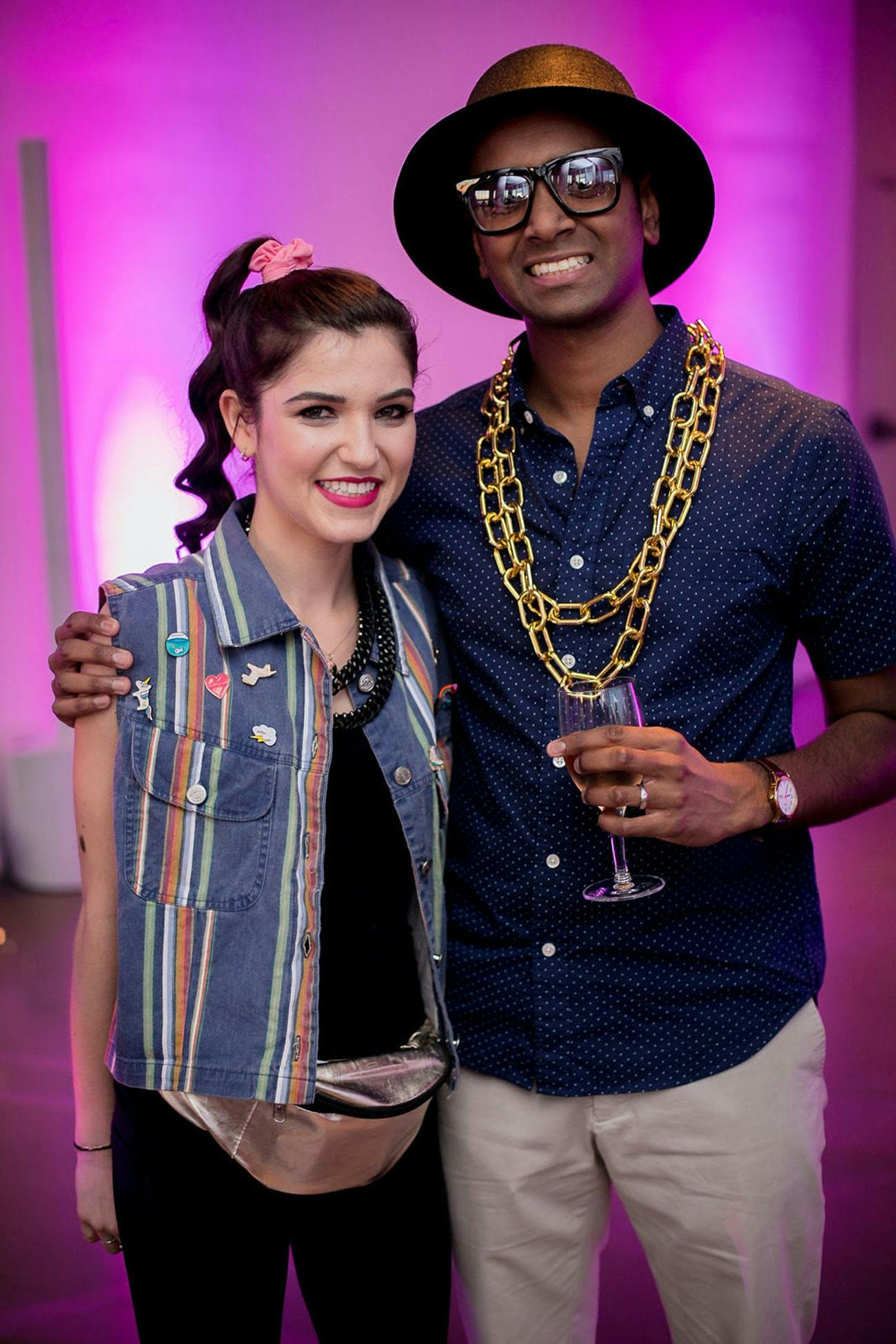 Two Friends Pose for an 80s-Themed Party Photo | PartySlate