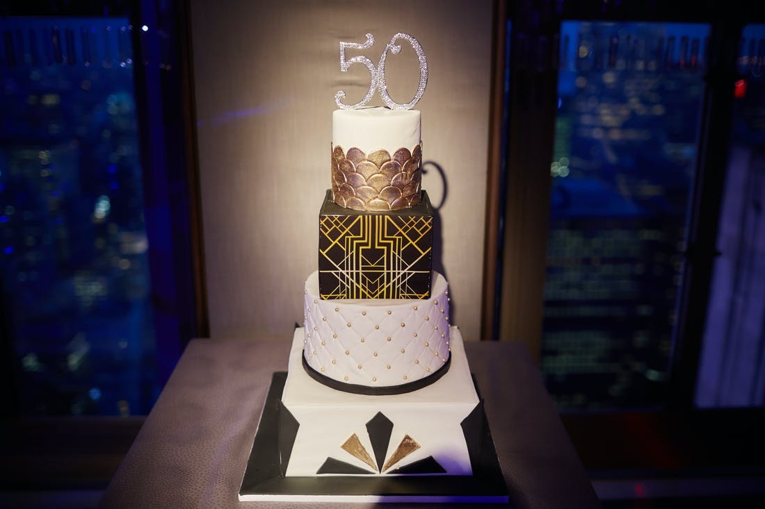 An Art Deco Tiered Birthday Cake at a Great Gatsby Themed | PartySlate Party
