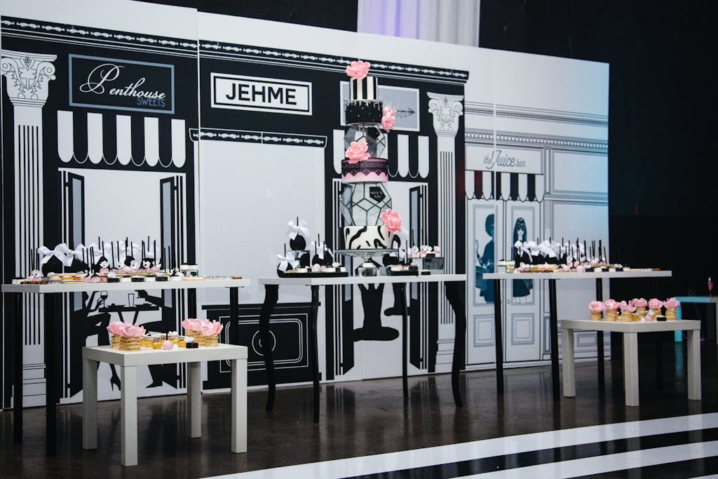 Paris-Themed Sweet 16 Store Front Photo Op in Pink, Black, and White Colors | PartySlate