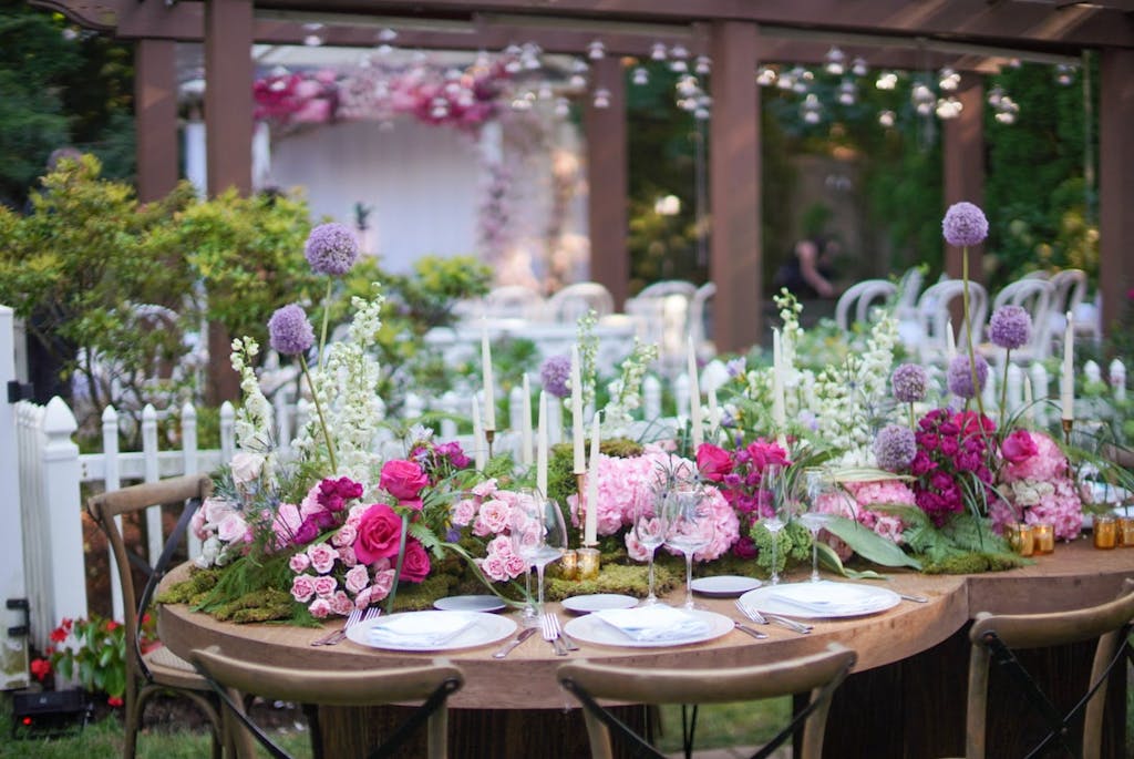A floral arrangement centerpiece on a tablescape.