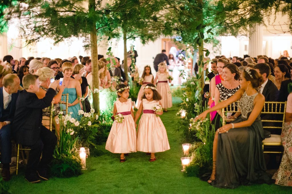 Enchanted Forest Wedding Themed Wedding Ceremony With Green Wedding Aisle | PartySlate
