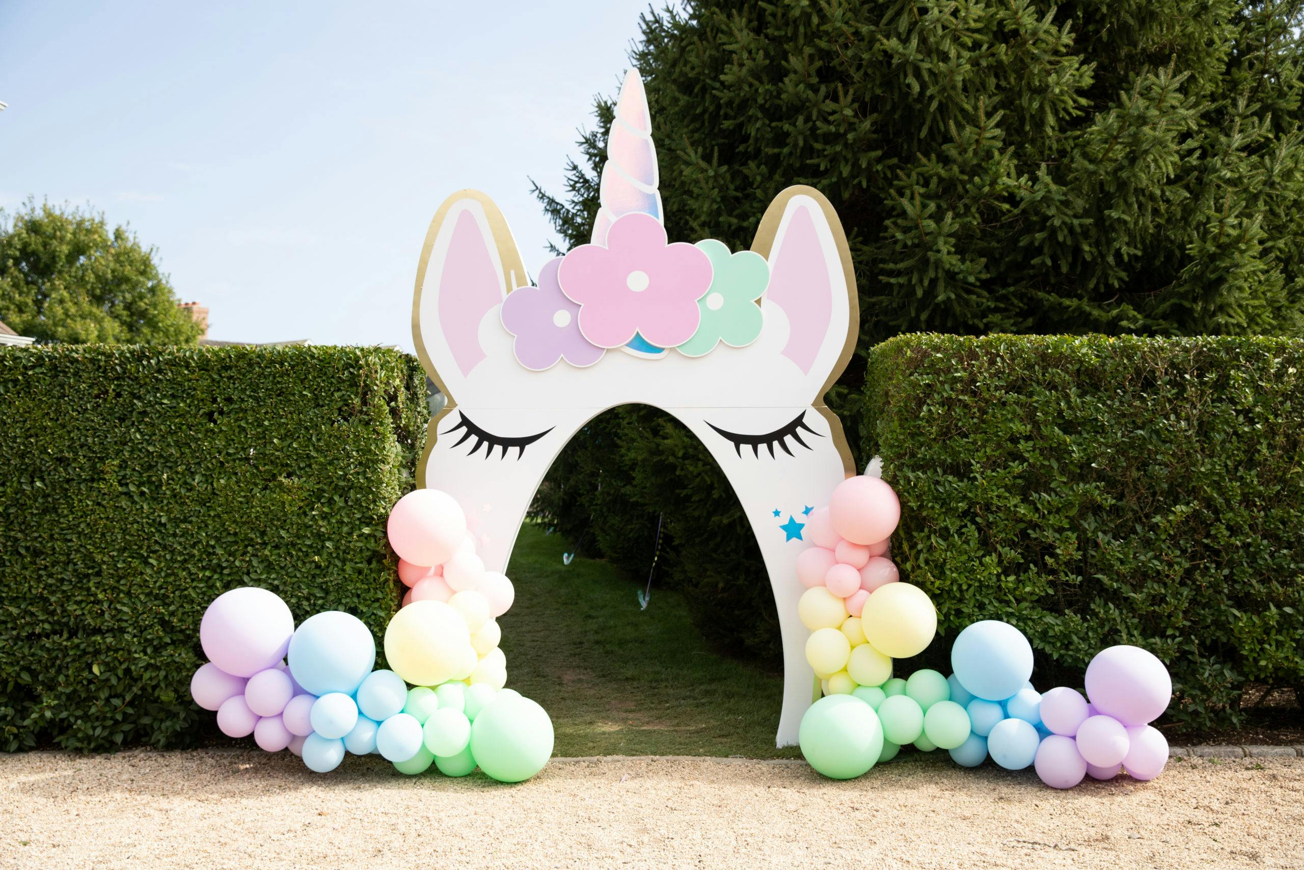 Kids 1st Birthday Party in Southampton, NY with Pastel Colored Unicorn Balloon Entrance | PartySlate