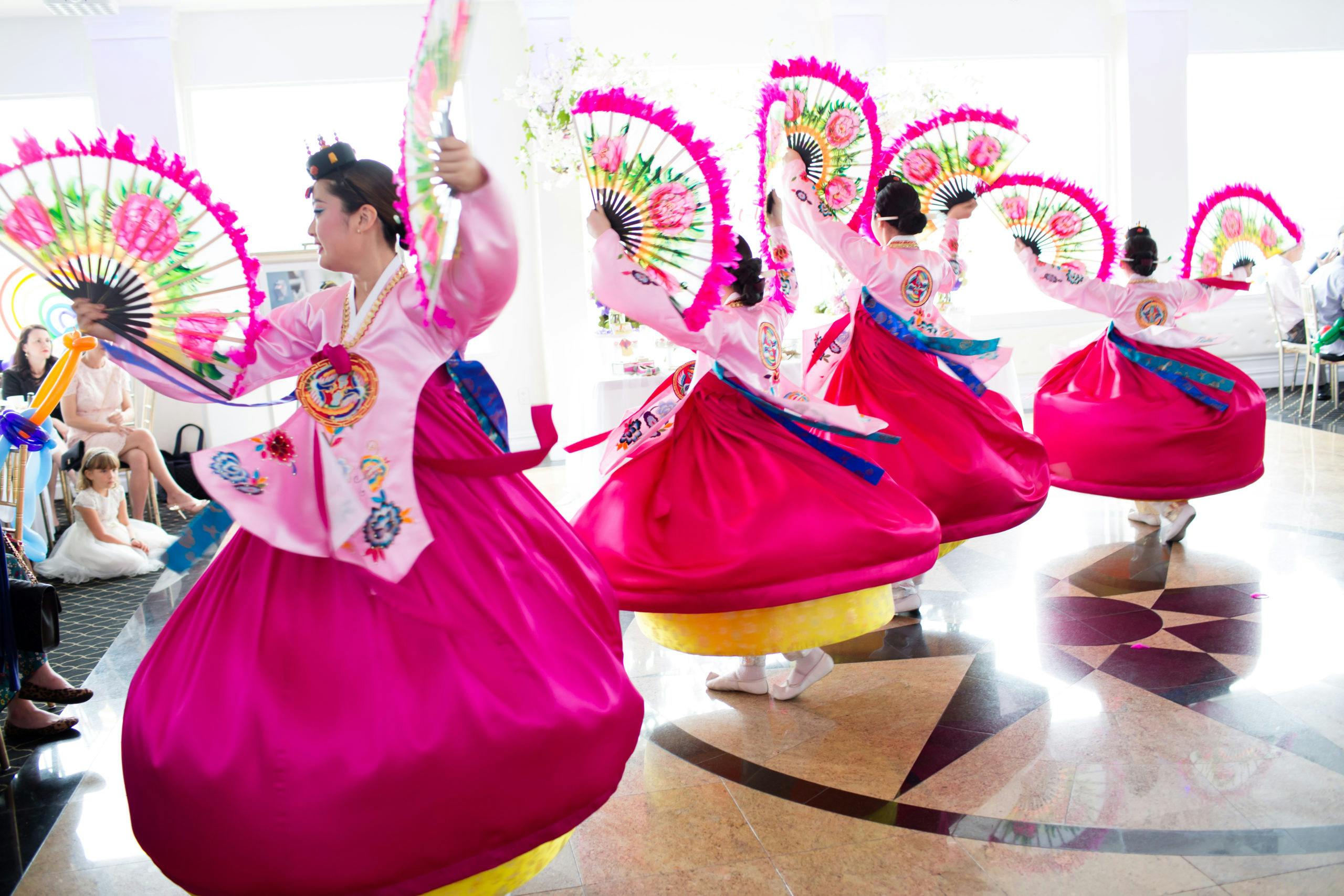 Delightful Pink and Green Kids First Birthday Party with Traditional Korean Performers Dancing | PartySlate