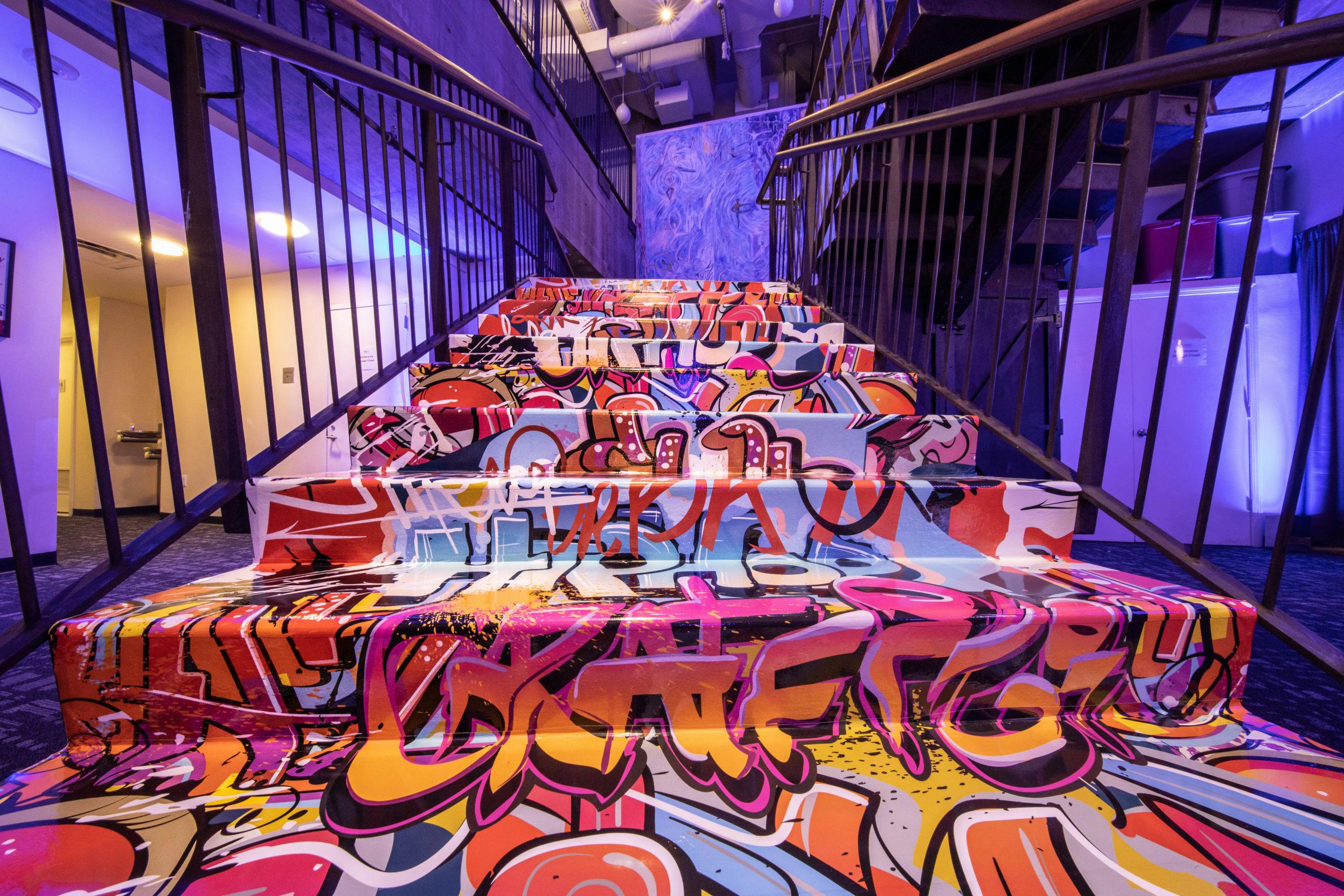 Hip Hop Graffiti Themed Kids Birthday Bash at Manhattan Movement + Art Center in New York with Graffiti on the Stairs and Walls | PartySlate