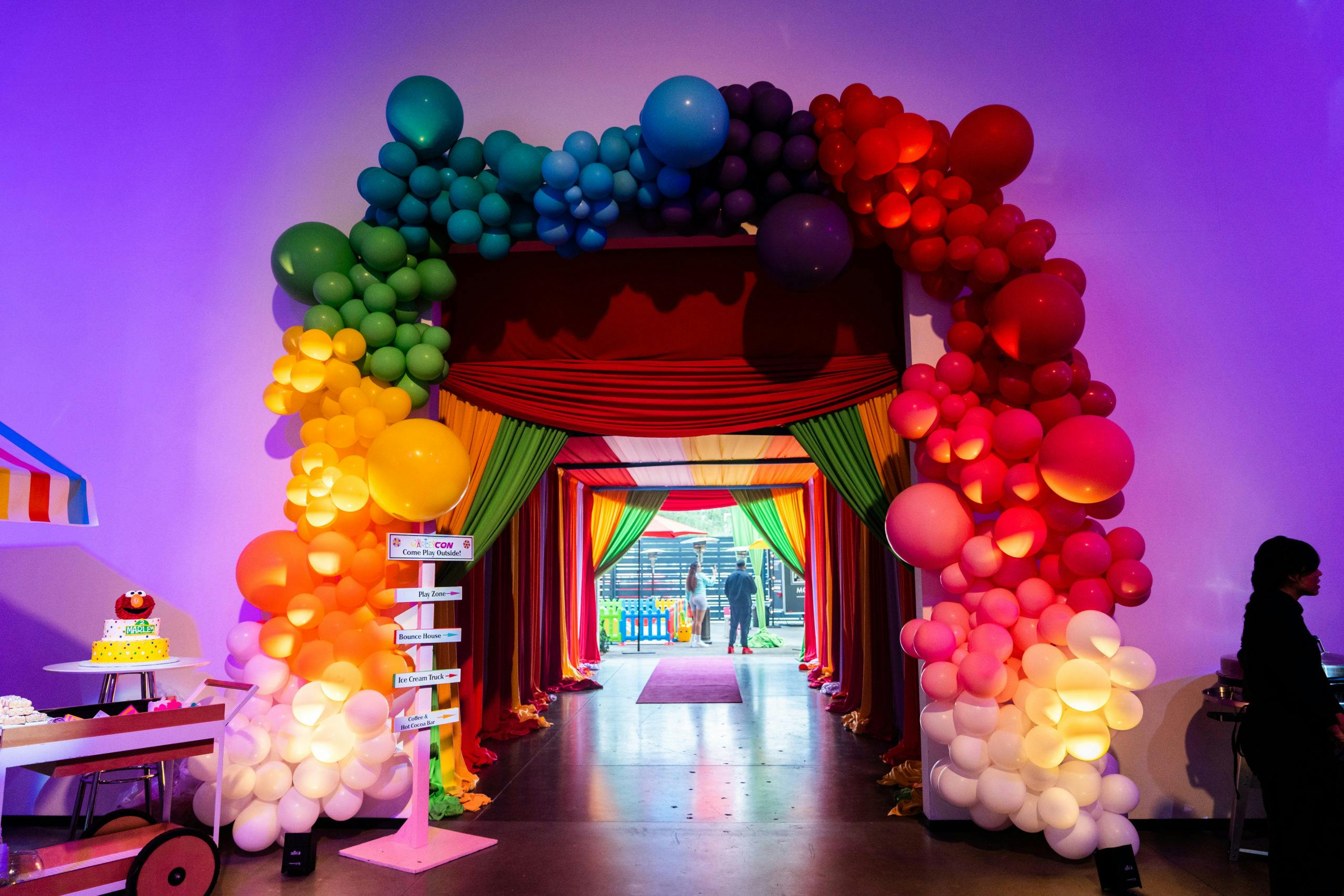 Marley Con Kids 2nd Birthday Party at AV Irvine in Irvine, CA with Colorful Balloon Arch Entrance | PartySlate