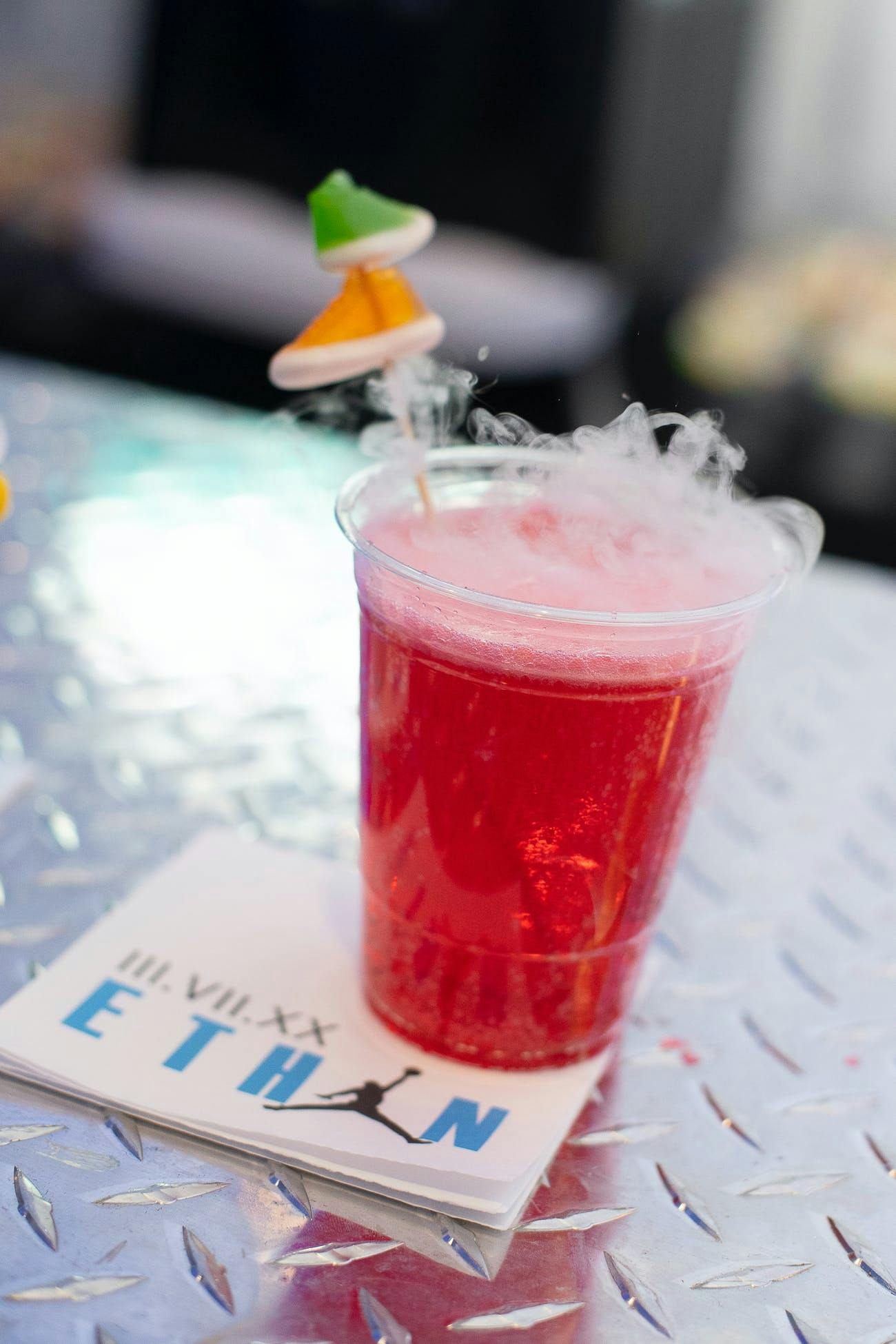 90's themed cocktail with shoe stirrers | PartySlate