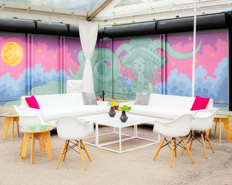 A Miami wedding venue space outdoors surrounded by murals | PartySlate