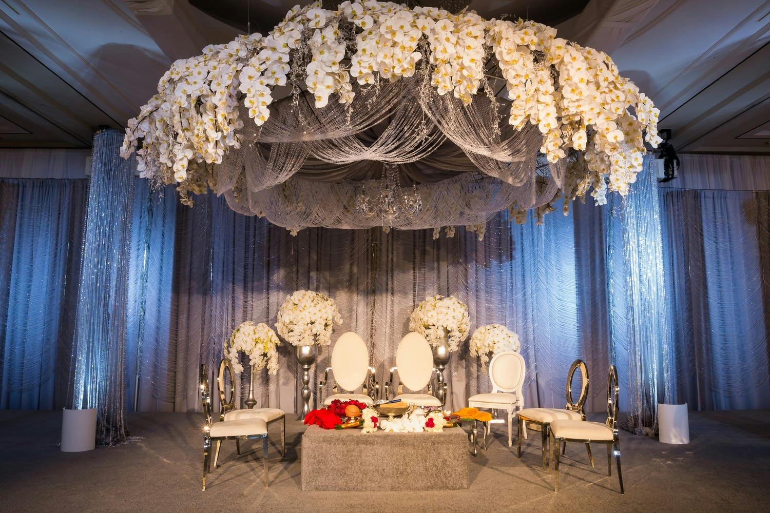 Mandap With Glittering Crystals and Luxe White Orchids | PartySlate
