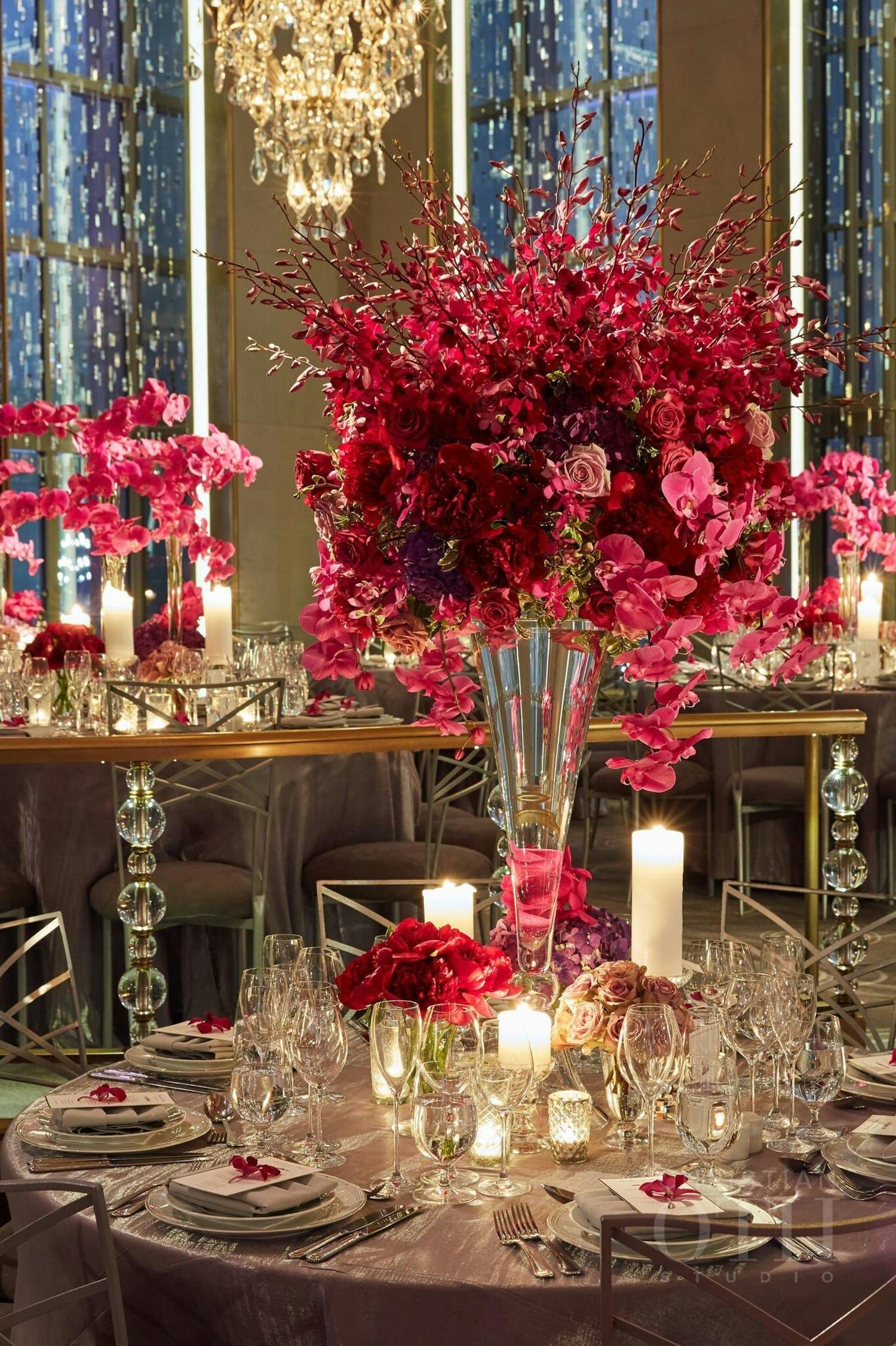 Ballroom Wedding With Candle Light and Luxe Pink Wedding Floral Centerpieces | PartySlate