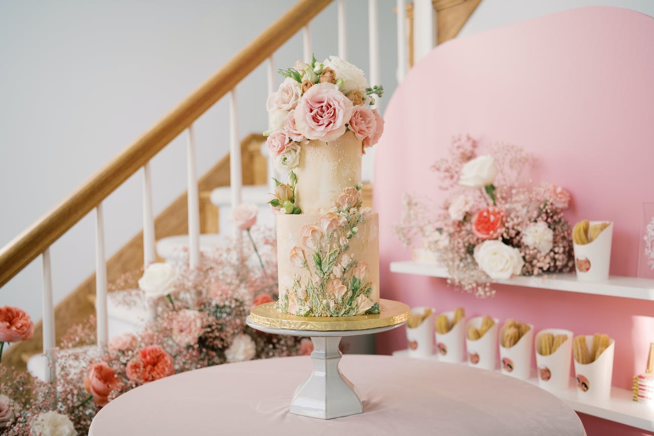 At-home Engagement Party With Pink, Cream and Light Colors on Cake | PartySlate