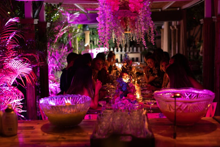 Private Party With Pink Uplighting in Garden at 27 Restaurant & Bar in Miami Beach, FL | PartySlate