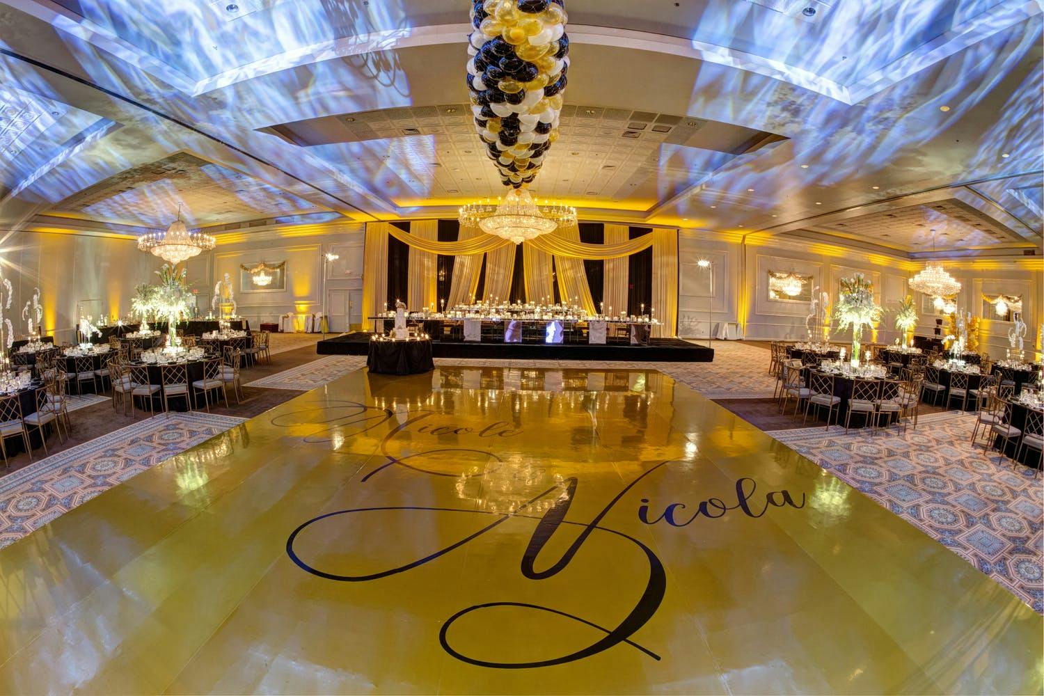 New Years Eve Wedding With Gold Dance Floor and Iridescent Ceiling Lighting Installation | PartySlate