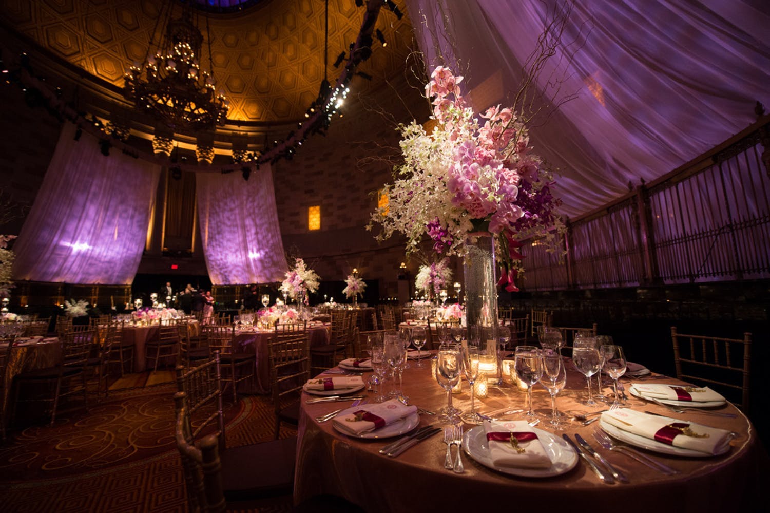 Wedding Ballroom With Illuminated Purple Drapery Billowing From Ceiling | PartySlate