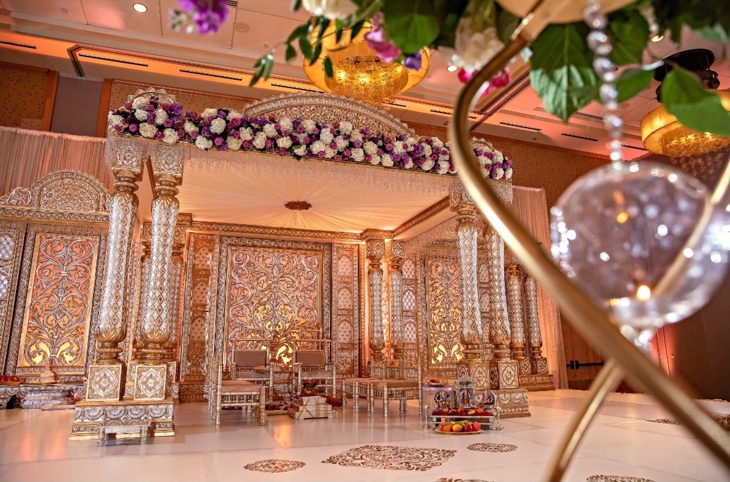 Mandap With Ornate Gold Details and Shimmering Crystals | PartySlate