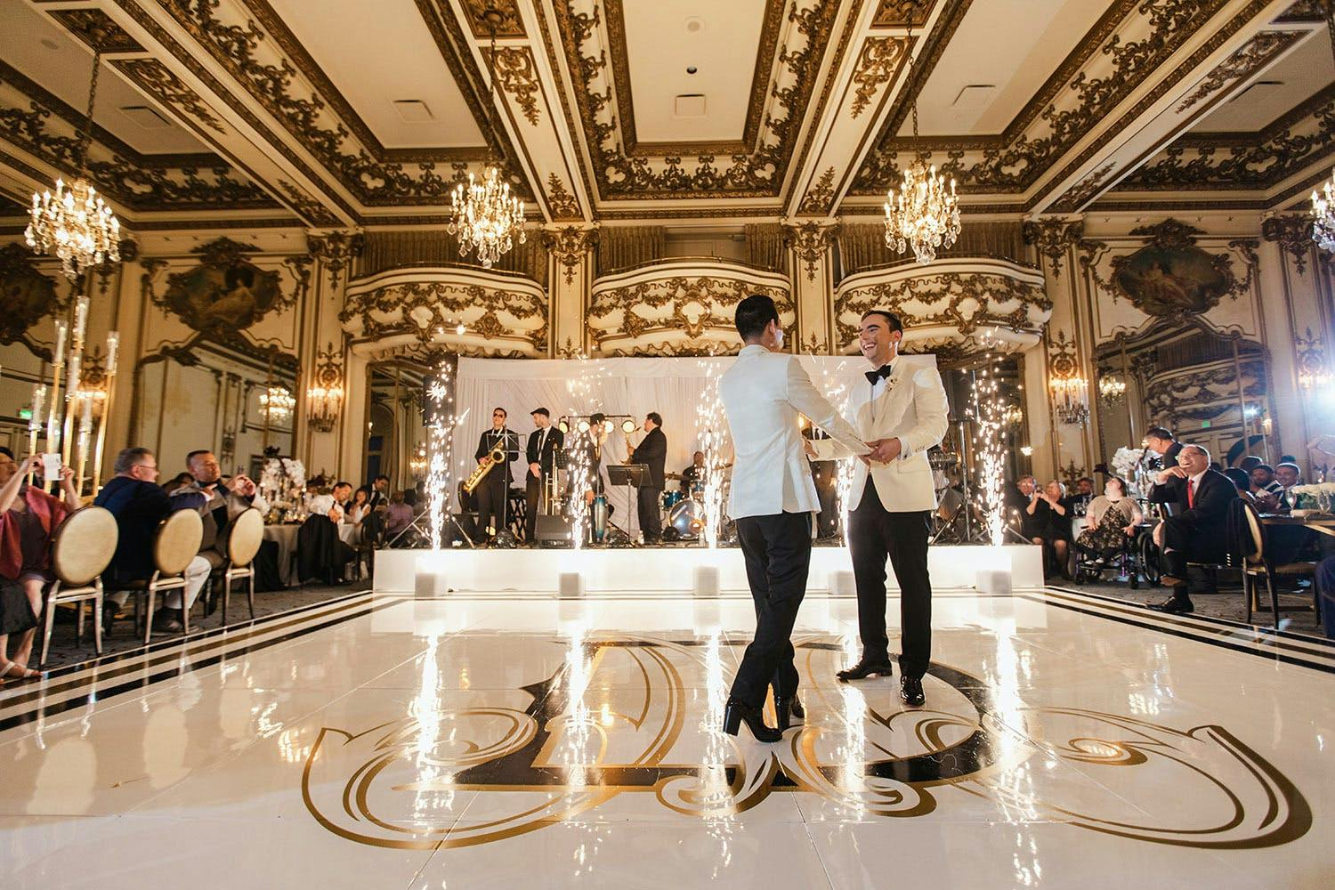 First Dance With Wedding Band Stage Lit by Cold Fireworks | PartySlate