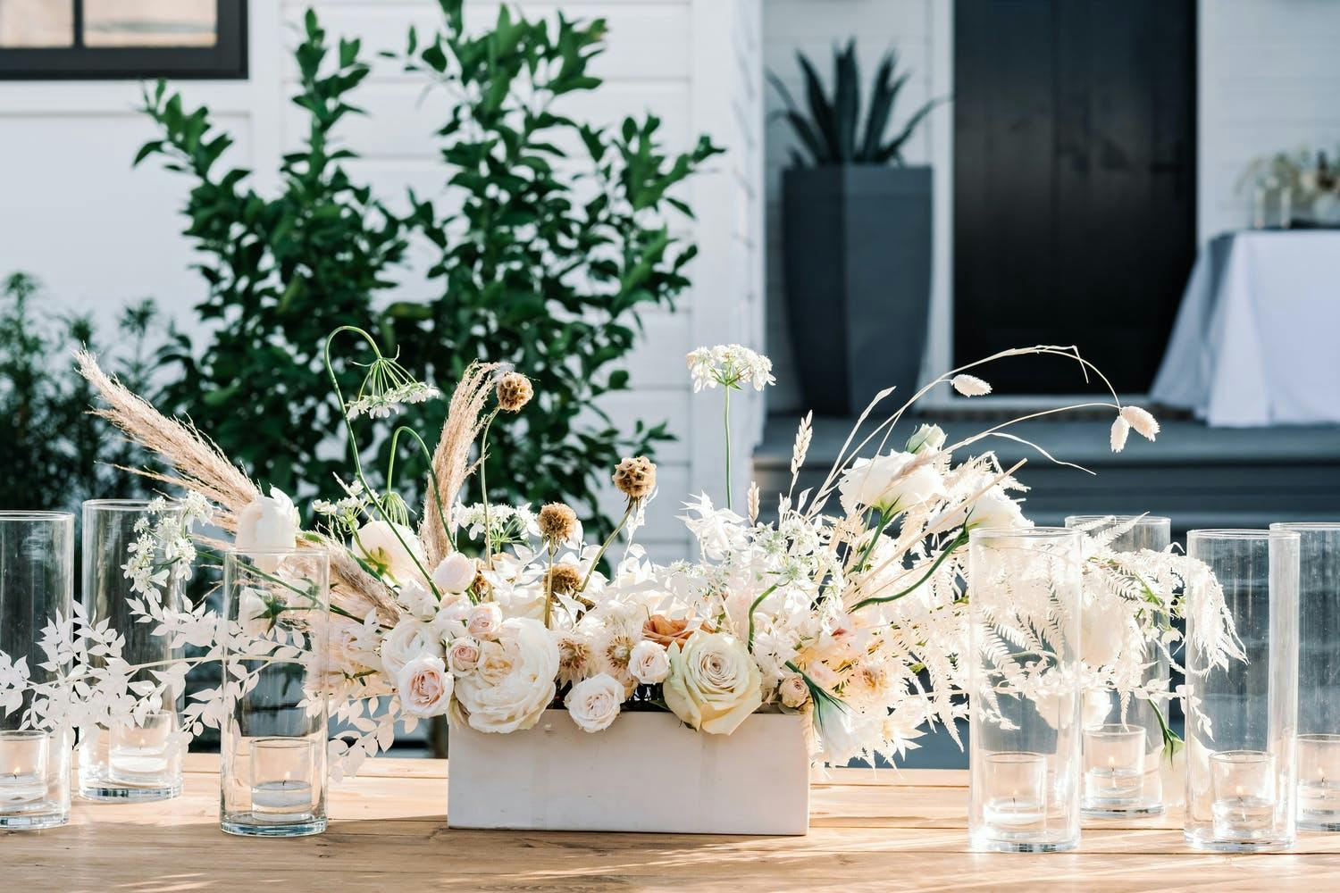 White and Earth-Toned Whimsical Beach Wedding Centerpiece | PartySlate