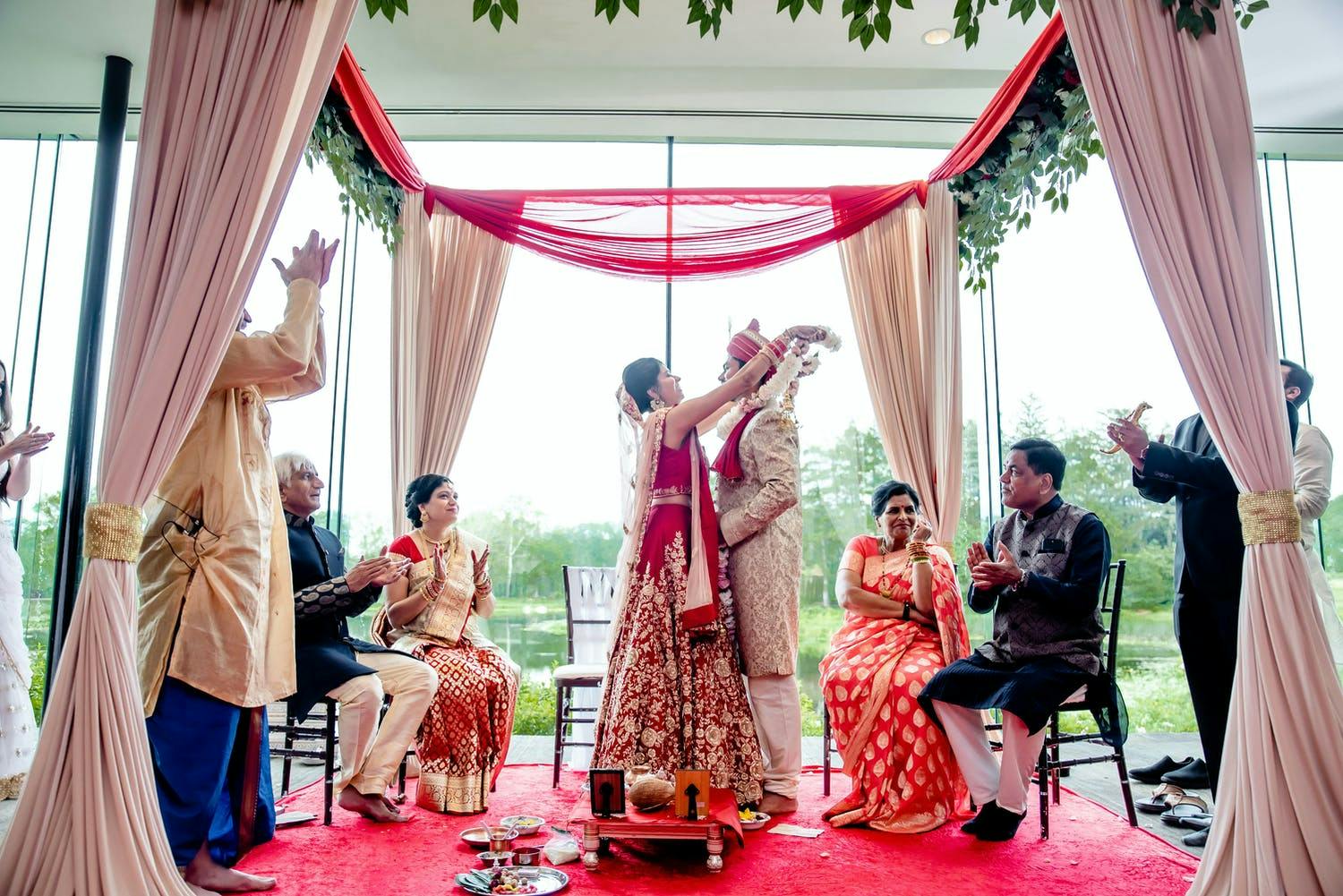 Mandap With Minimalist Frame and Sheer Drapery | PartySlate