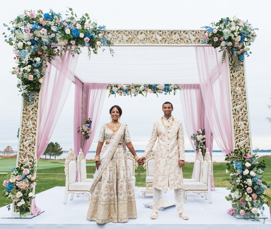 Mandap With Sleek Lines and Billowing Drapery | PartySlate