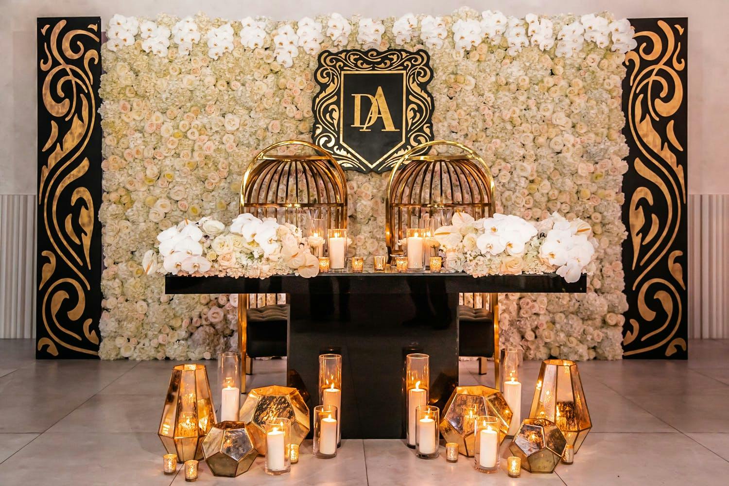 Art Deco-Style Sweetheart Table With Golden Lantern Décor at Foot of Table | PartySlate