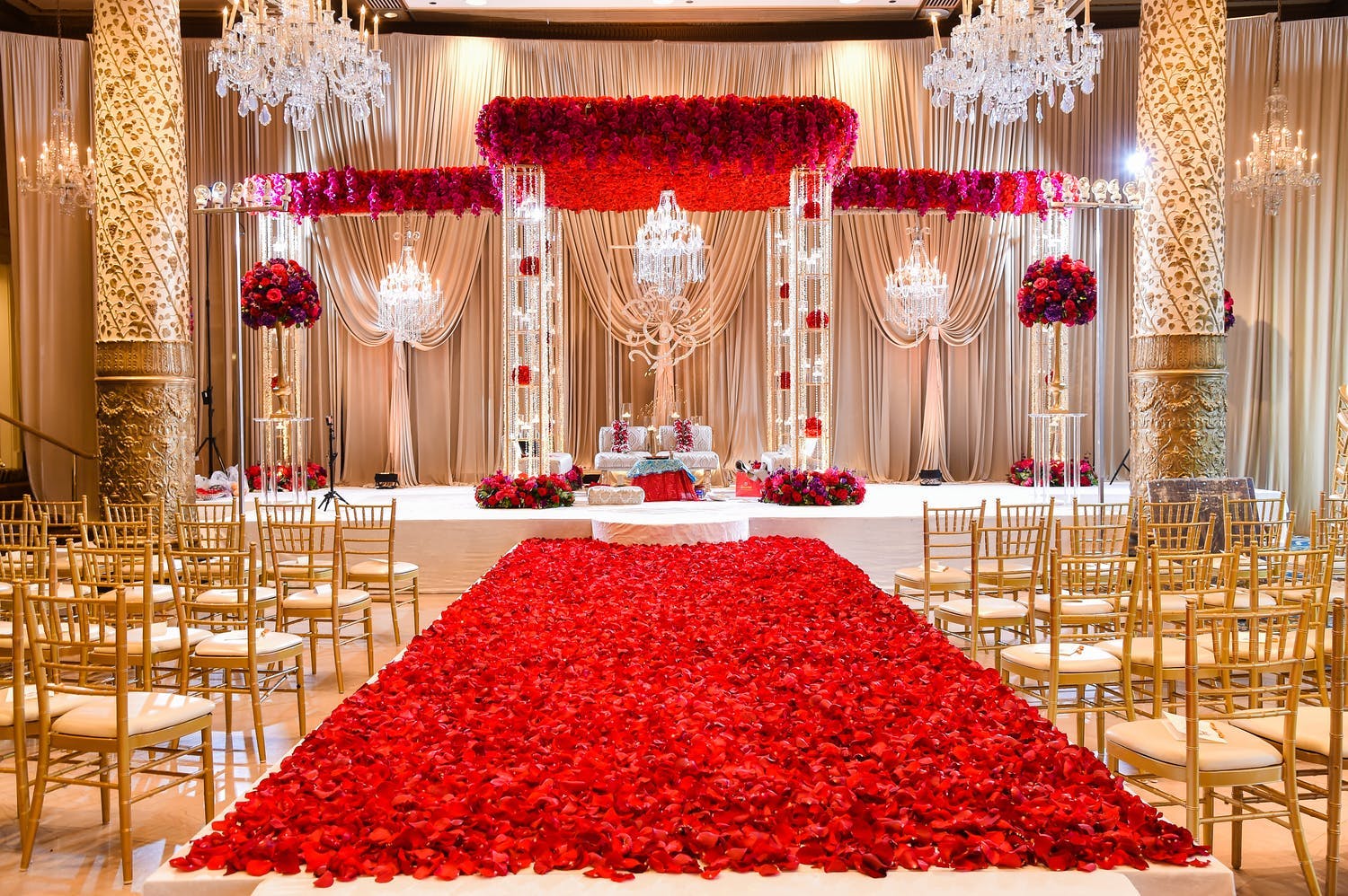 Mandap With Acrylic Structure and Floating Red Roses | PartySlate