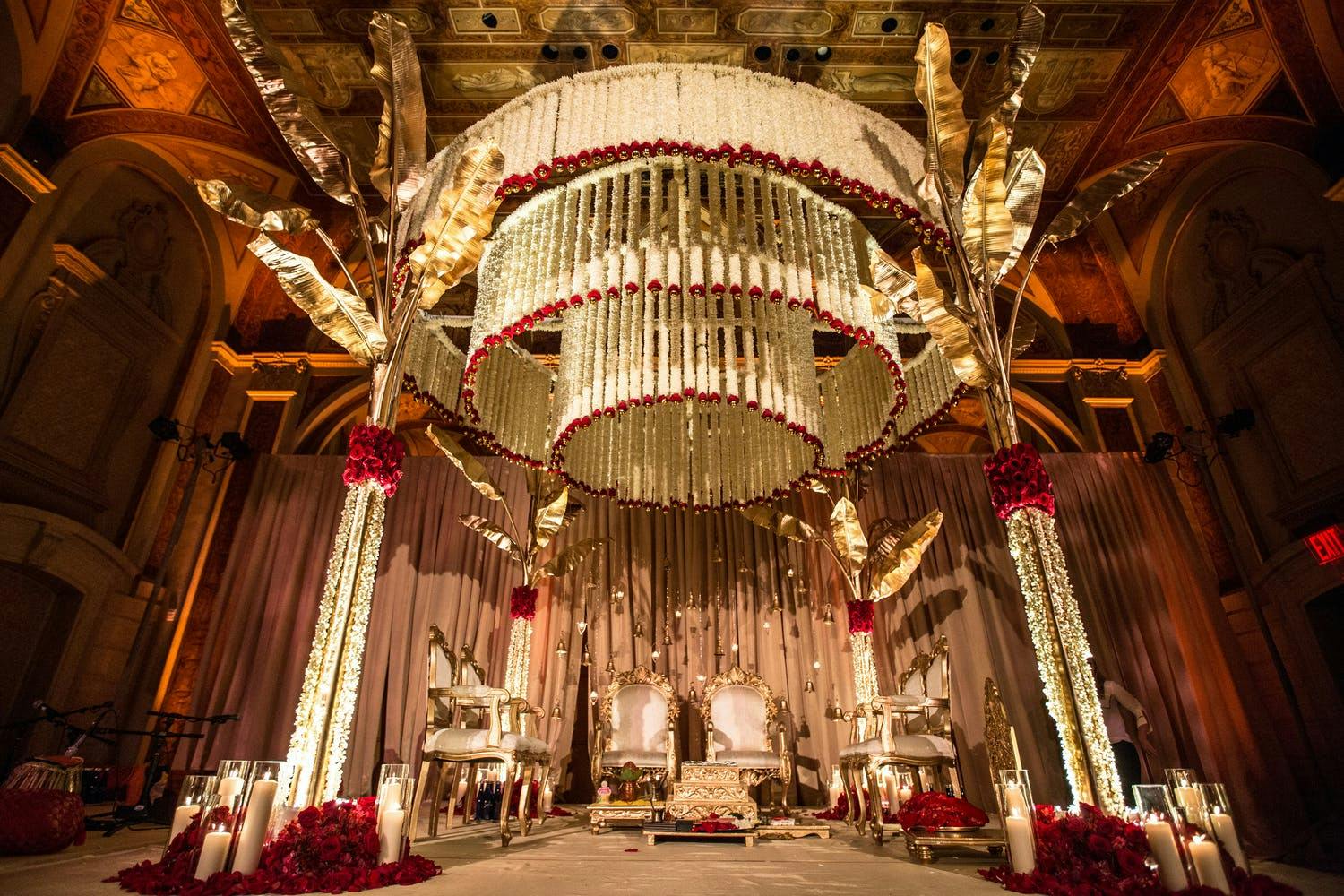 Mandap With Hundreds of Ivory Flowers Tipped in Red Roses | PartySlate