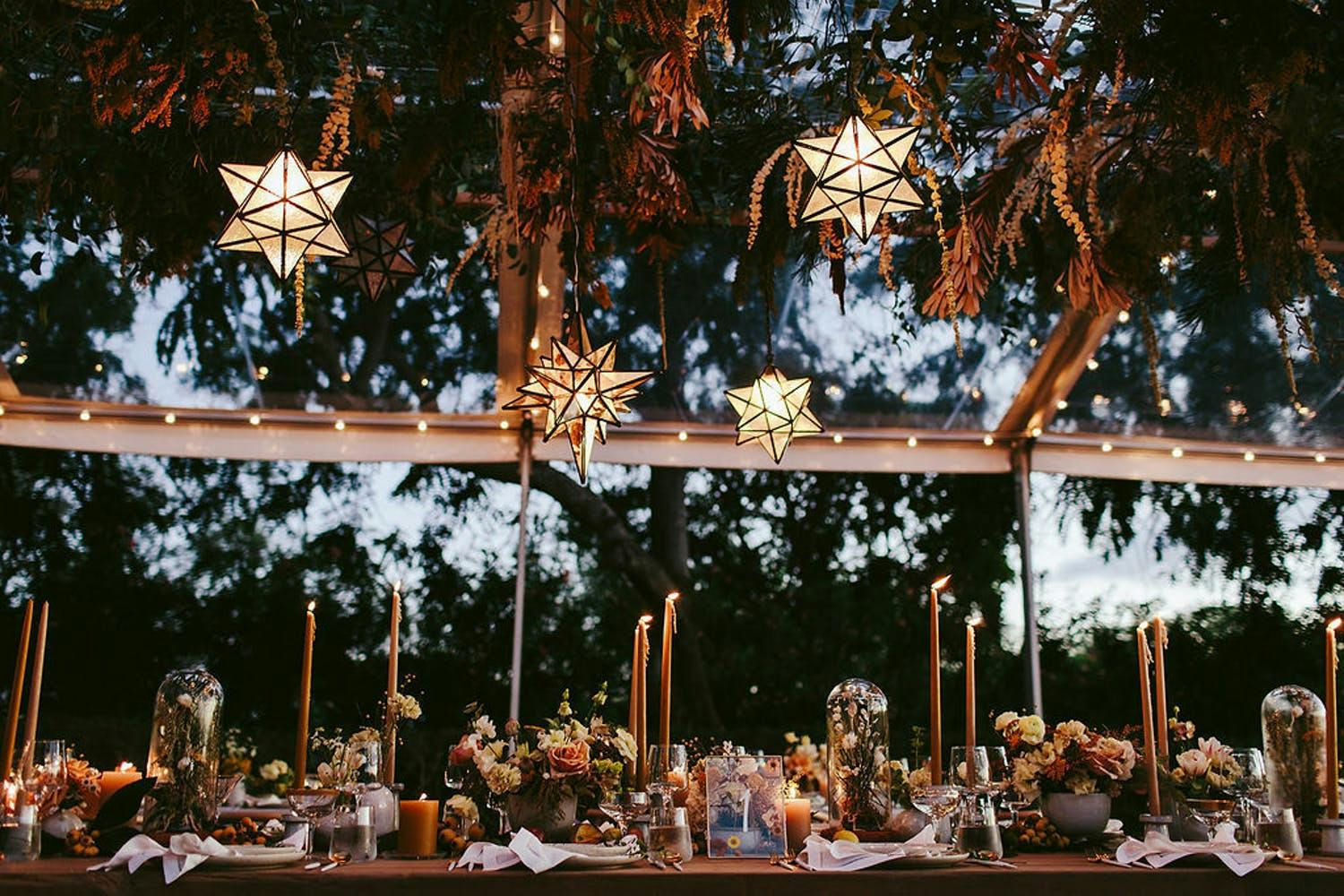 Wedding Tablescape With Cloche Jars, Amber-Hued Blooms, and Suspended Geometric Lanterns | PartySlate