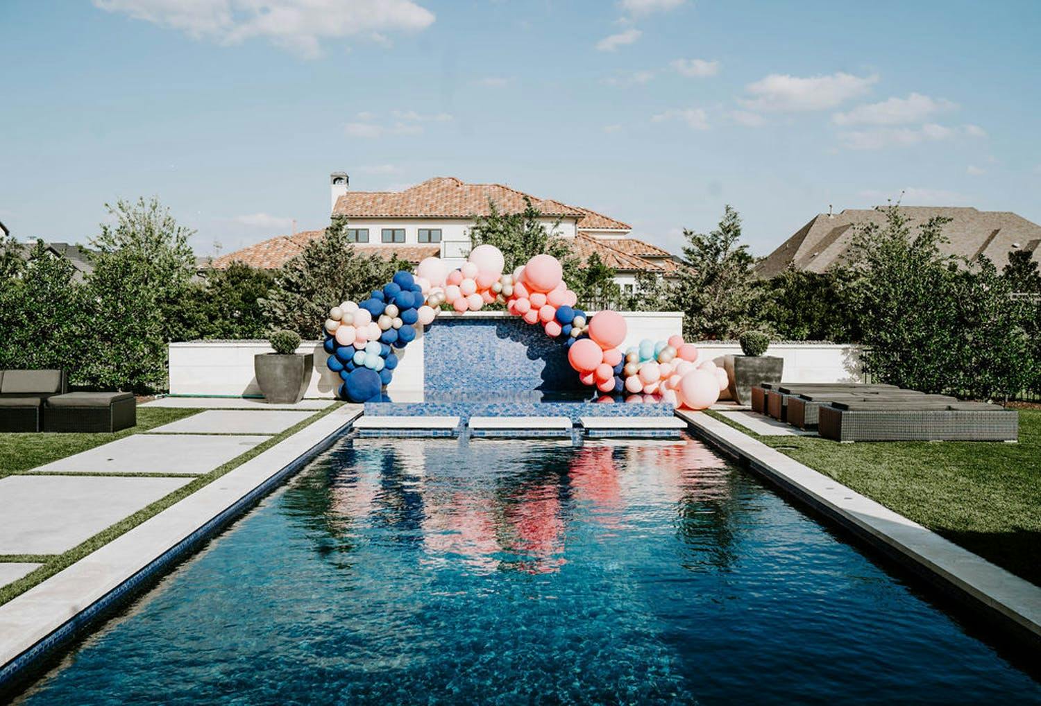 Pink and Blue Wave Baby Shower Balloon Arch | PartySlate