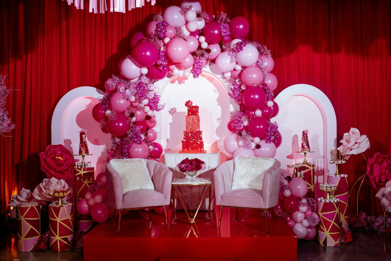 Pink Ombré Baby Shower Balloon Arch With Sprigs of Lilac | PartySlate