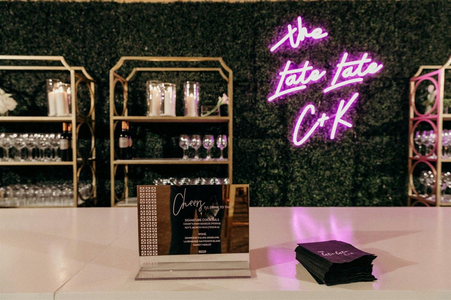 Wedding Bar With PInk Neon Lighting Signage | PartySlate