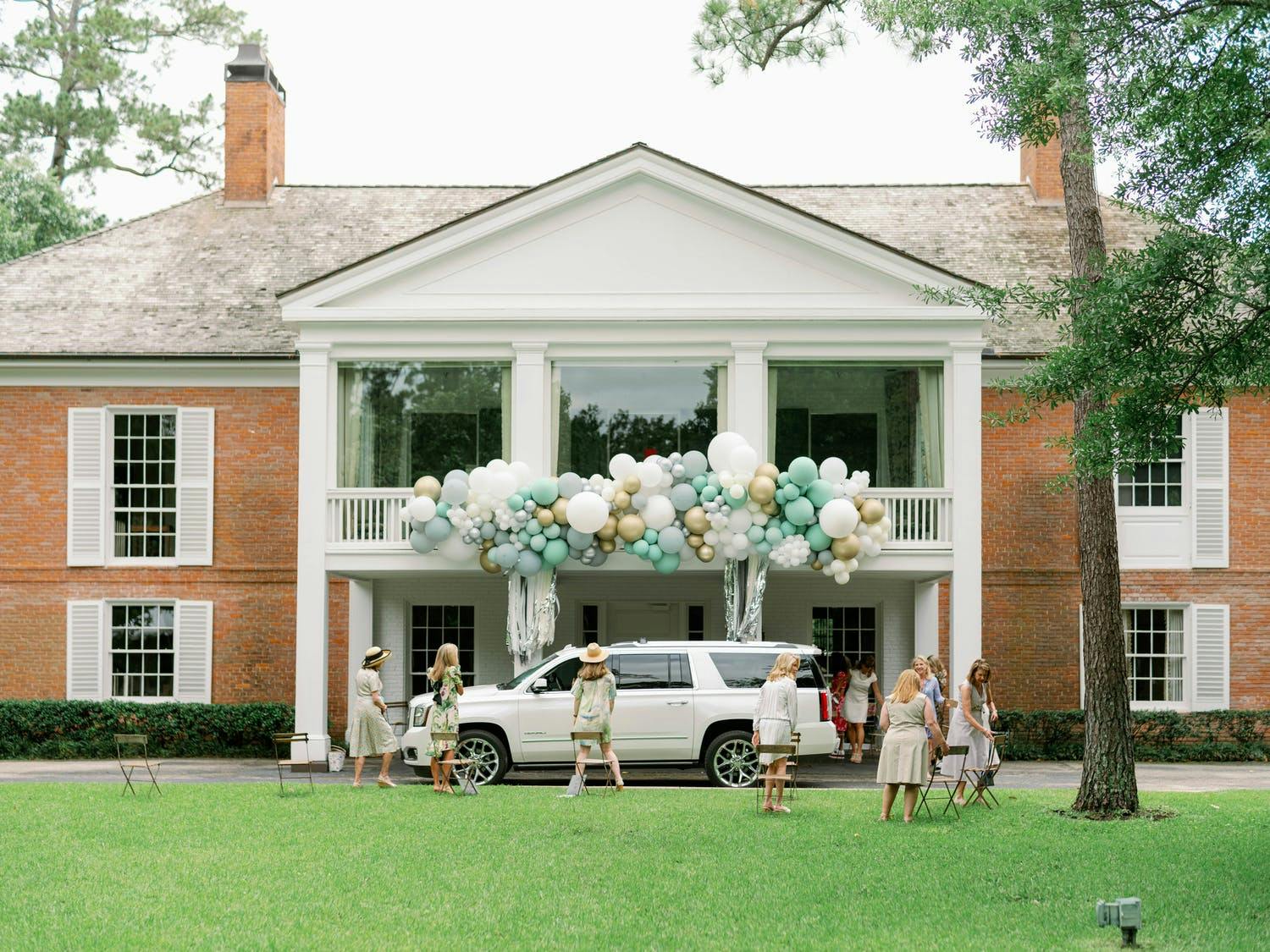 Drive By Baby Shower With Balloon Cloud and Rain Fringe Tassels | PartySlate