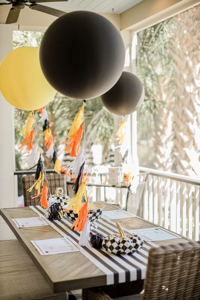 Black, Gold, Orange Tablescape for Kid's Construction-Themed Birthday Party | PartySlate