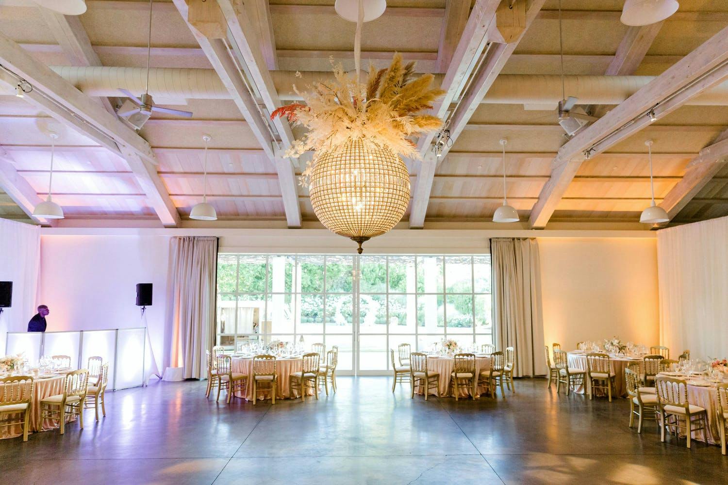 Glass Orbed Wedding Chandelier With Pampas Grass Topper | PartySlate