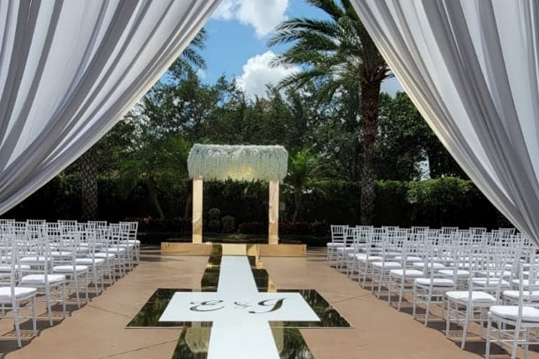 Modern Outdoor Wedding Ceremony With Gold Mirrored Arch and Wedding Aisle | PartySlate