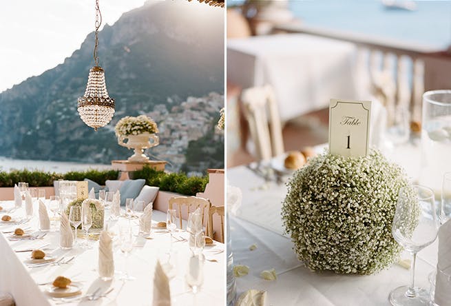 Outdoor Wedding Reception in Positano With Tables Numbers Resting on Orbs of Baby’s Breath | PartySlate